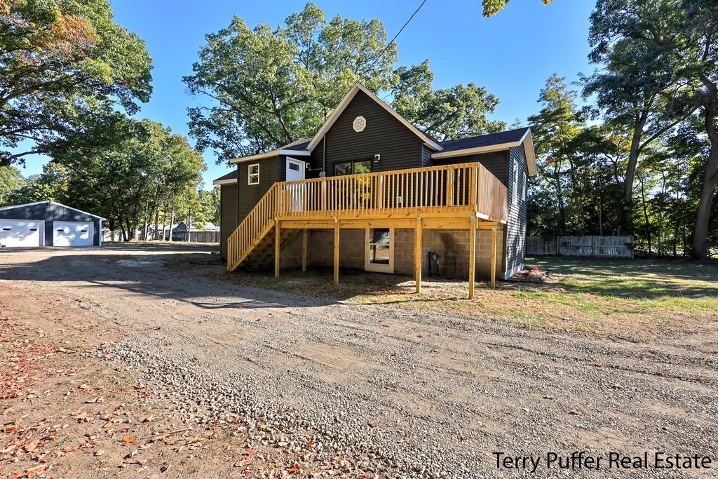 Photo of 764 E Giles Road, Muskegon, MI 49445 (MLS # 25052130)