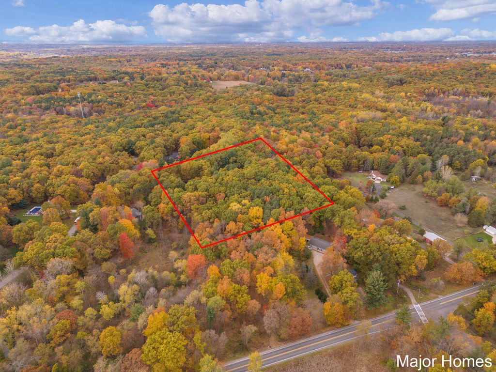 Photo of 5575 Ramsdell Drive NE, Rockford, MI 49341 (MLS # 25056193)