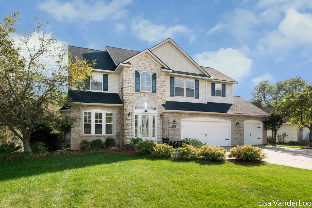 Photo of 3050 Sir Charles Drive NE, Rockford, MI 49341 (MLS # 25049467)