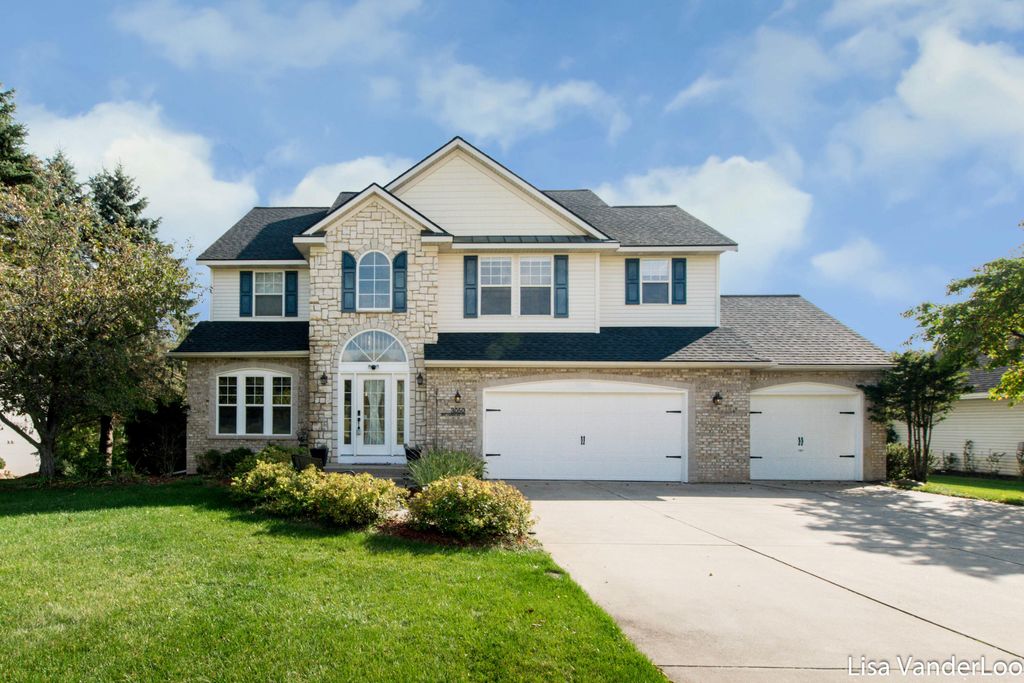 Photo of 3050 Sir Charles Drive NE, Rockford, MI 49341 (MLS # 25049467)