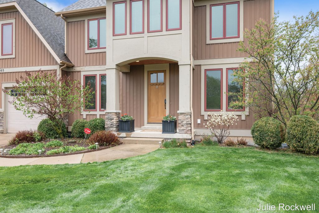 Photo of 4985 W Village Court SE, Ada, MI 49301 (MLS # 26019116)