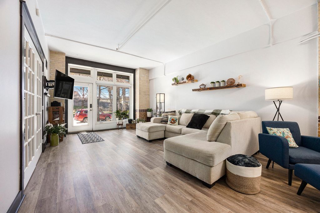 Photo of 600 Broadway Avenue NW #117, Grand Rapids, MI 49504 (MLS # 25024692)