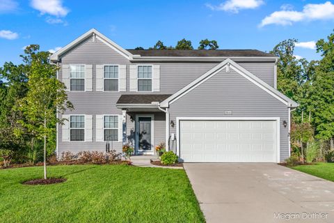 Photo of 10644 Woodbushe Drive SE, Lowell, MI 49331 (MLS # 26016058)