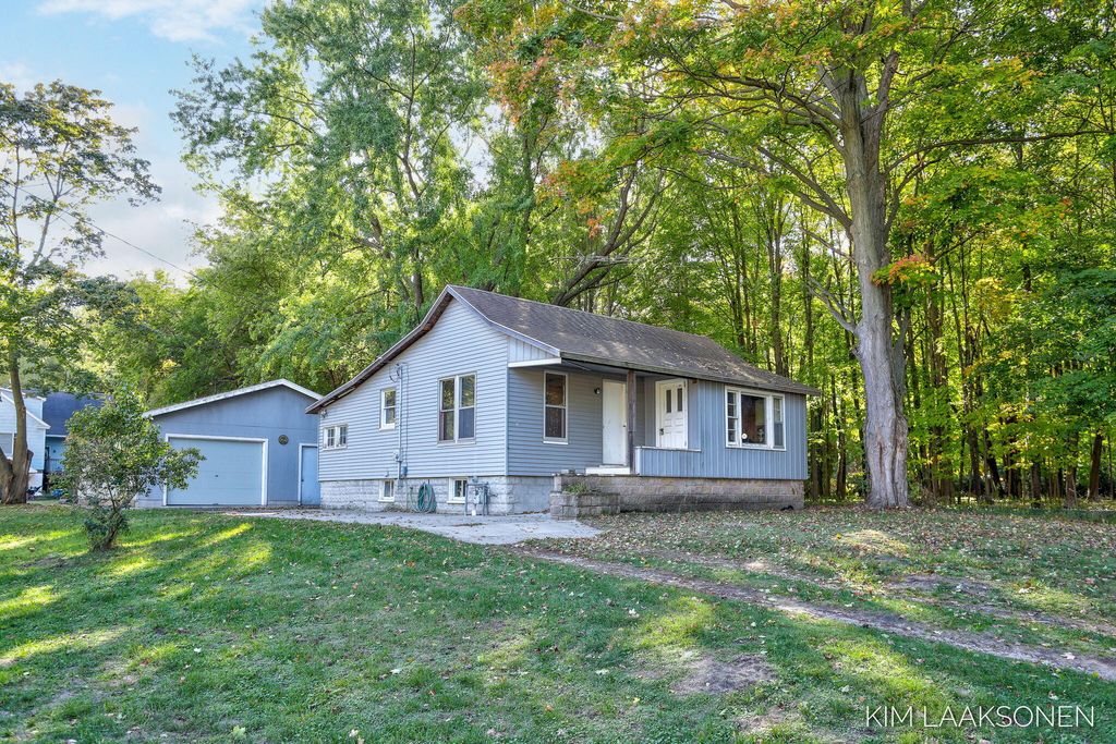 Photo of 1340 South Shore Drive, Holland, MI 49423 (MLS # 25054796)