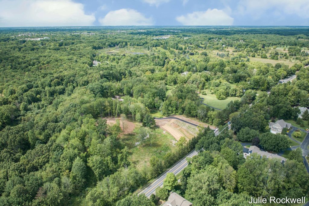 Photo of 639 Crahen Avenue NE, Grand Rapids, MI 49525 (MLS # 25056265)