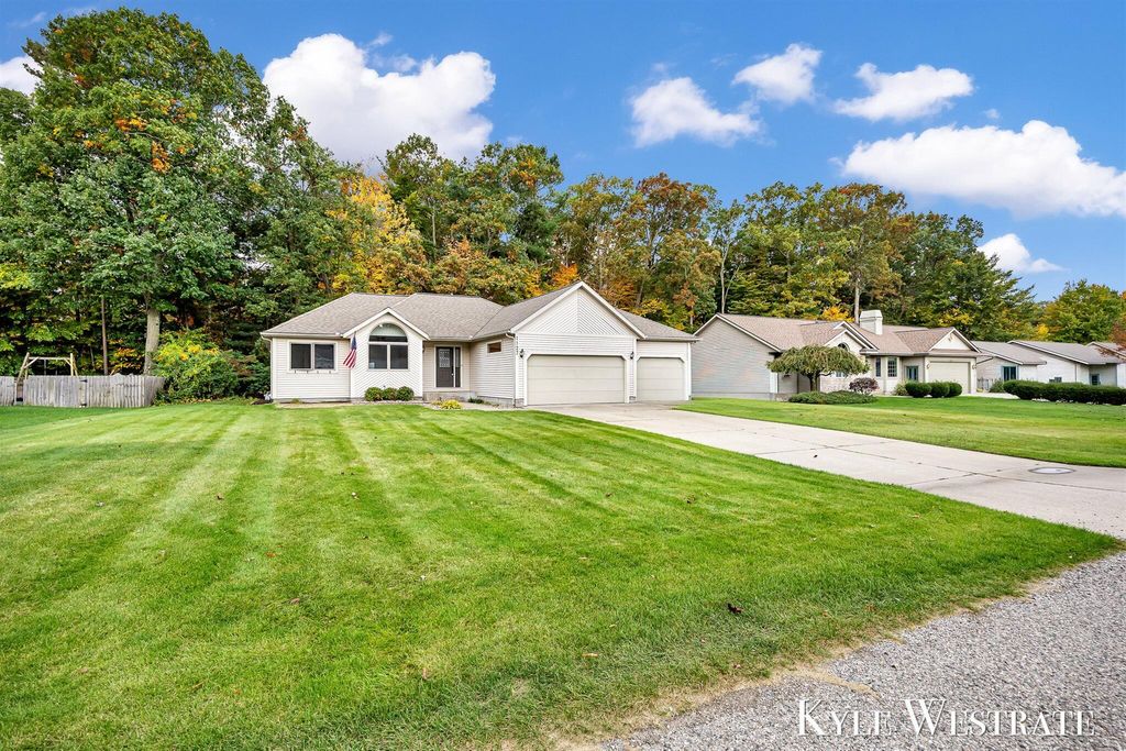 Photo of 1127 S Robinhood Drive, Muskegon, MI 49445 (MLS # 25055275)