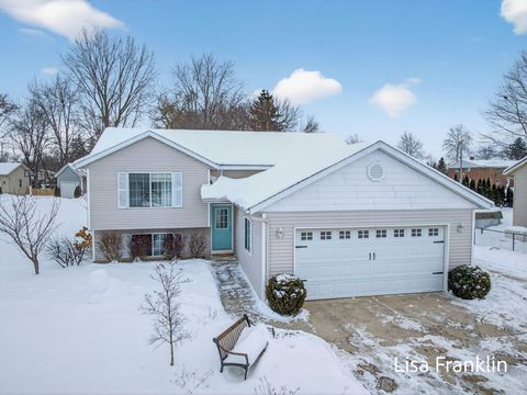 Photo of 5541 Eric Street, Allendale, MI 49401 (MLS # 25062048)