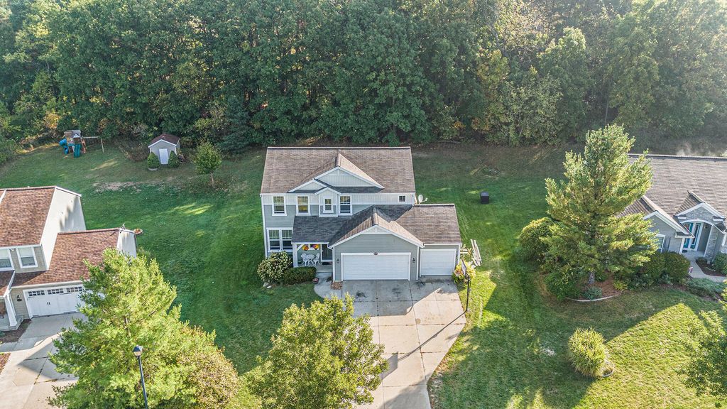 Photo of 9700 Sunset Ridge Drive NE, Rockford, MI 49341 (MLS # 25049737)