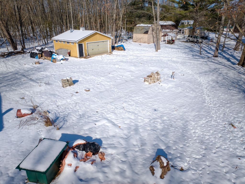 Photo of 301 Shady Lane, Six Lakes, MI 48886 (MLS # 26005903)