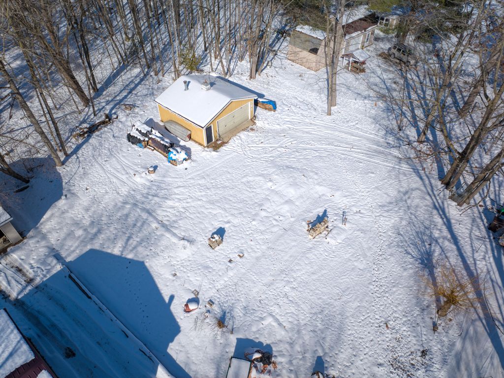 Photo of 301 Shady Lane, Six Lakes, MI 48886 (MLS # 26005903)