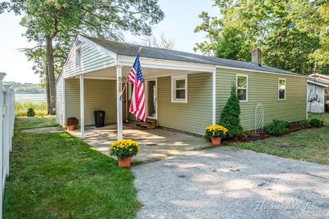 Photo of 305 McNitt Road, Manistee, MI 49660 (MLS # 25048242)
