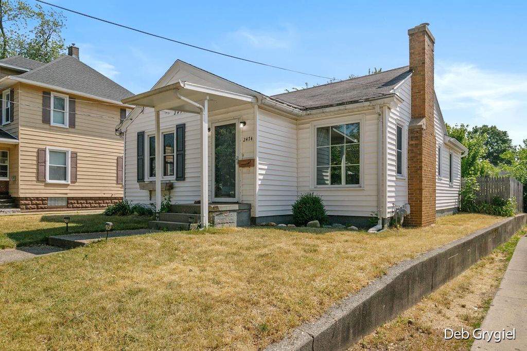 Photo of 2474 Central Avenue SW, Wyoming, MI 49519 (MLS # 23021497)