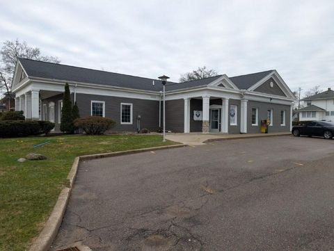 Photo of 720 Capital Avenue SW, Battle Creek, MI 49015 (MLS # 26013270)