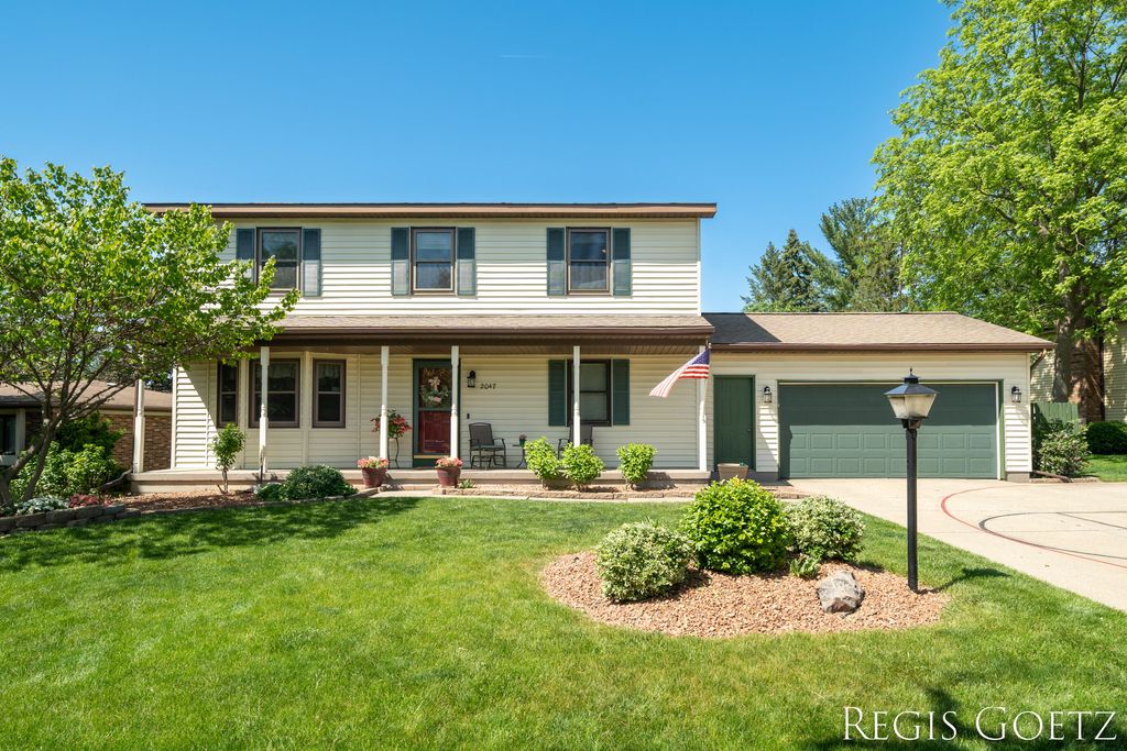 Photo of 2047 Wolfboro Drive SE, Kentwood, MI 49508 (MLS # 23018053)