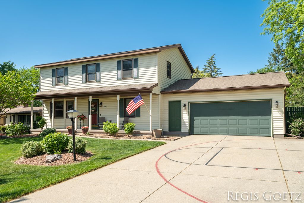 Photo of 2047 Wolfboro Drive SE, Kentwood, MI 49508 (MLS # 23018053)