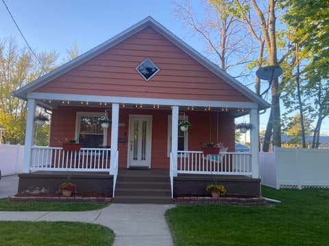 Photo of 1180 W Grand Avenue, Muskegon, MI 49441 (MLS # 26021675)