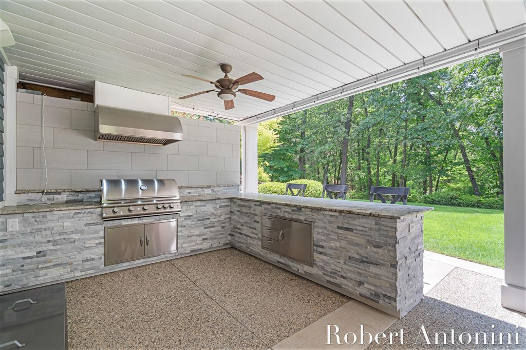 Photo of 1977 Emerald Glen Court NE, Ada, MI 49301 (MLS # 25049334)