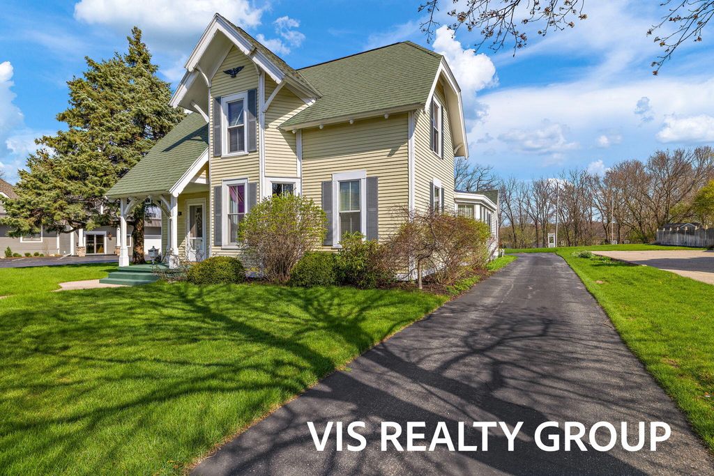Photo of 223 E Savidge Street, Spring Lake, MI 49456 (MLS # 26000775)