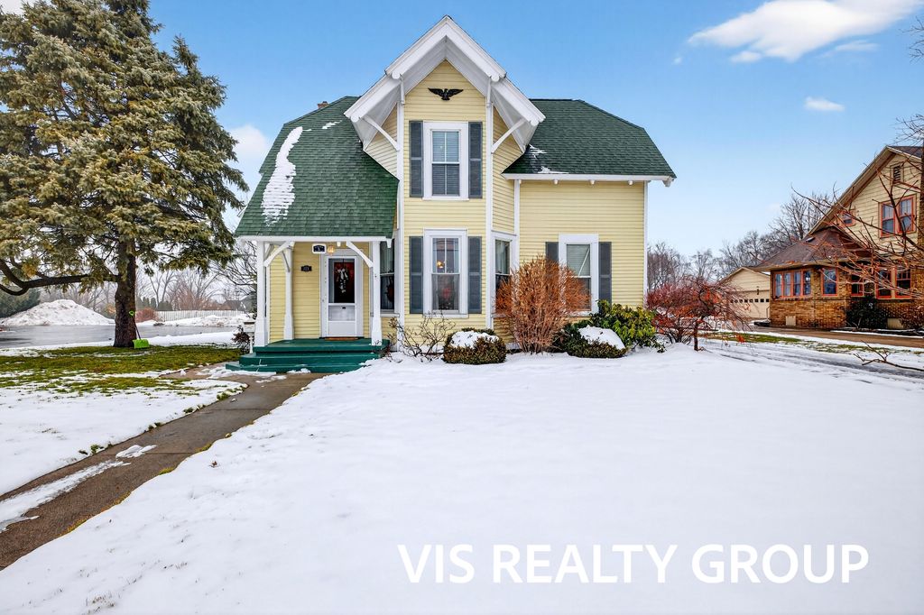 Photo of 223 E Savidge Street, Spring Lake, MI 49456 (MLS # 26000775)