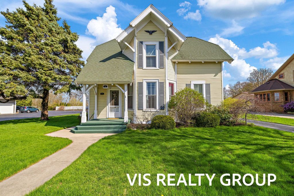 Photo of 223 E Savidge Street, Spring Lake, MI 49456 (MLS # 26000775)