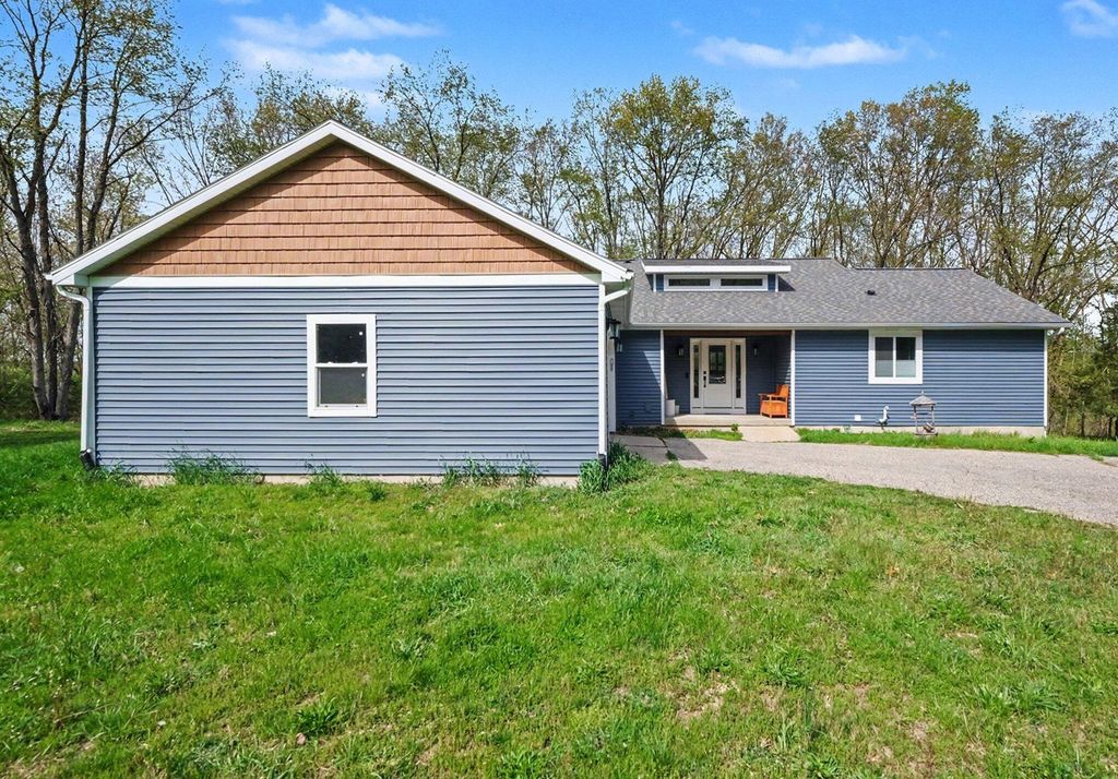 Photo of 8300 Grand River Drive SE, Ada, MI 49301 (MLS # 26019274)