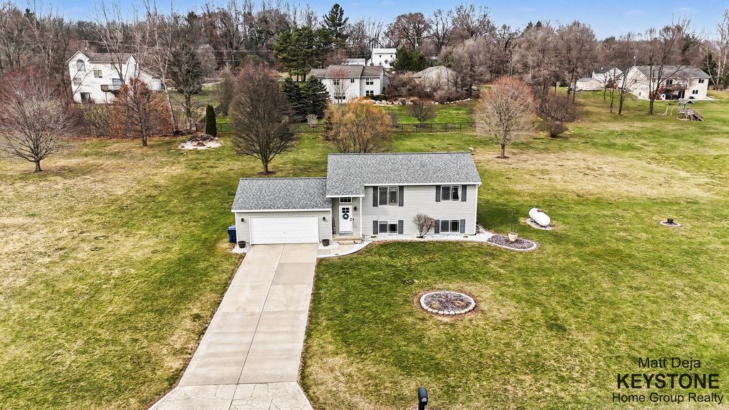 Photo of 3567 Jacobs Corner Road NE, Rockford, MI 49341 (MLS # 26011614)