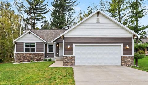 Photo of 1161 N Hillside Drive, Ludington, MI 49431 (MLS # 26022929)