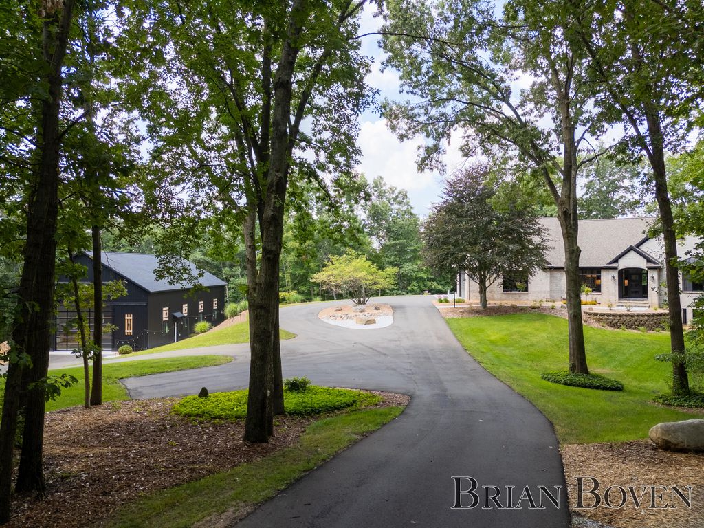 Photo of 8311 Rum Creek Trail NE, Rockford, MI 49341 (MLS # 25041236)