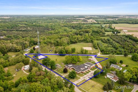 Photo of 306 W Russell Street, Hubbardston, MI 48845 (MLS # 25027287)