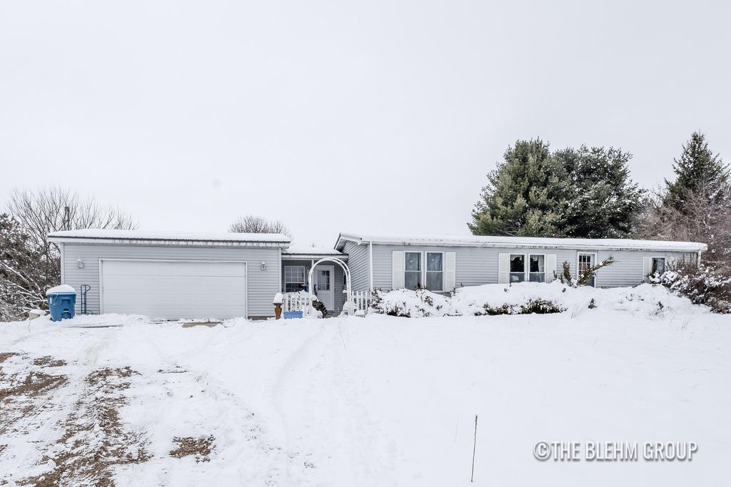 Photo of 8121 10 Mile Road NE, Rockford, MI 49341 (MLS # 25060695)