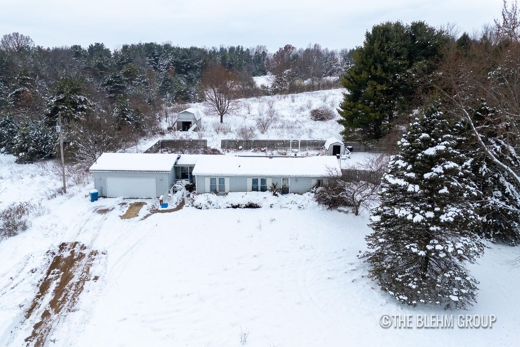 Photo of 8121 10 Mile Road NE, Rockford, MI 49341 (MLS # 25060695)