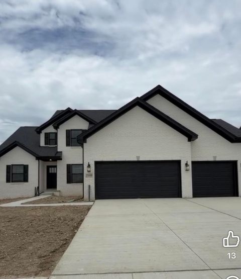 Photo of 25660 Brighton Lane, Brownstown, MI 48134 (MLS # 26022949)