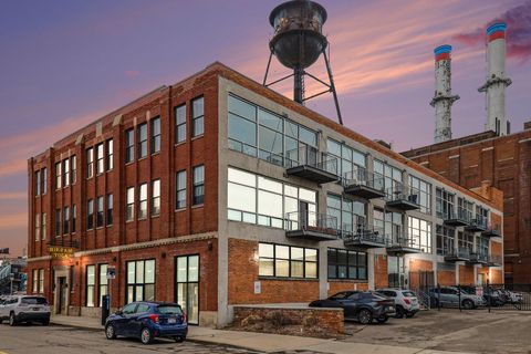 Photo of 55 W Canfield Street #104, Detroit, MI 48201 (MLS # 26013254)