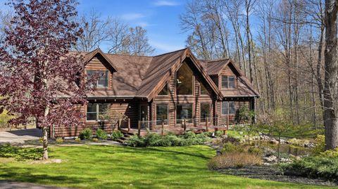 Photo of 10301 Mountain View Trail, Canadian Lakes, MI 49346 (MLS # 26021815)