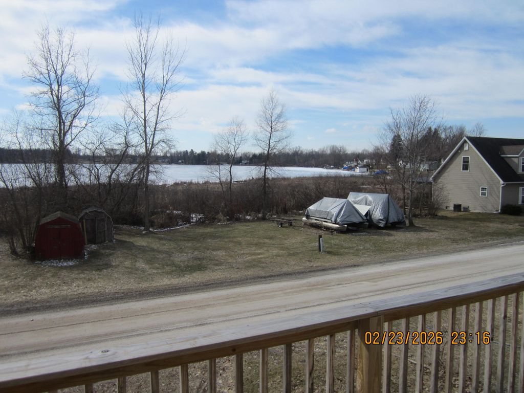 Photo of 11019 Crooked Lake Drive NE, Rockford, MI 49341 (MLS # 26008838)