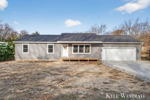 Photo of 579 S Walker Road, Muskegon, MI 49442 (MLS # 26009856)