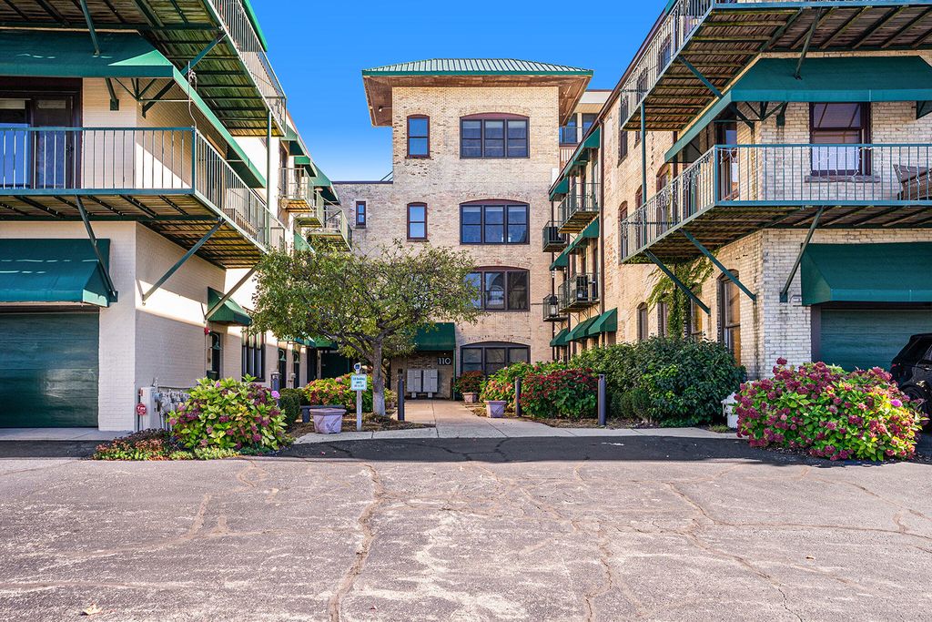 Photo of 110 N Harbor Drive #304, Grand Haven, MI 49417 (MLS # 26005092)