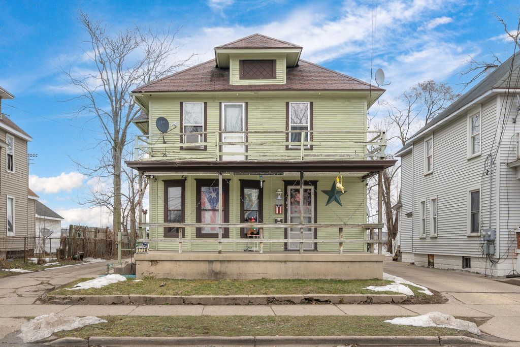 Photo of 1728 Godfrey Avenue SW, Wyoming, MI 49509 (MLS # 23006592)