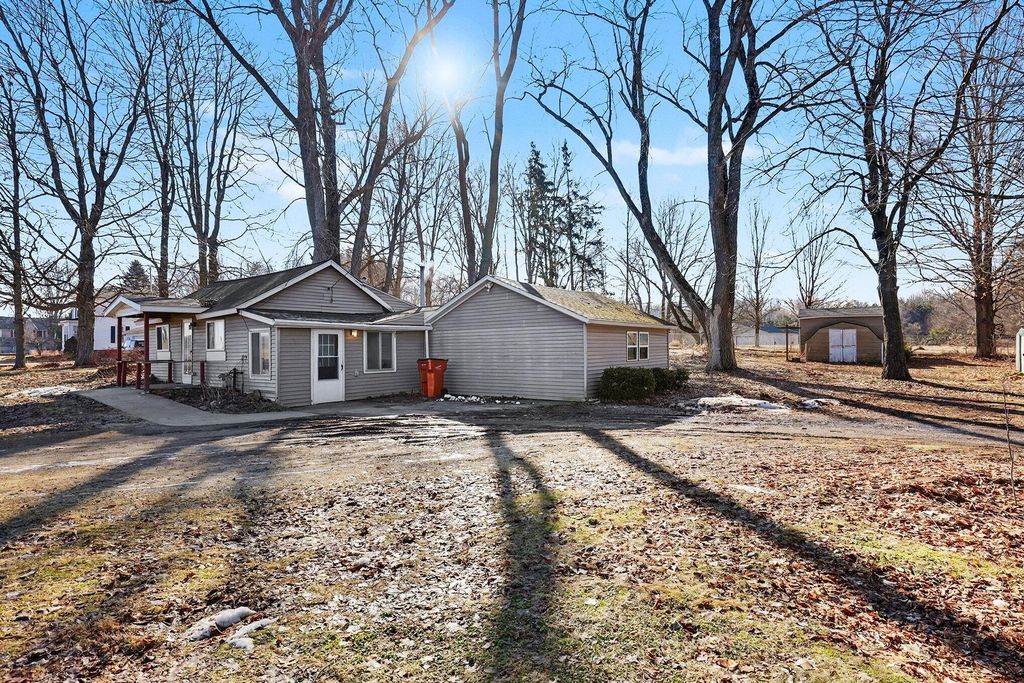 Photo of 9558 Belding Road NE, Rockford, MI 49341 (MLS # 26008205)