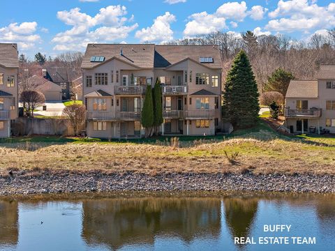 Photo of 1671 E Harbour Towne Circle, Muskegon, MI 49441 (MLS # 26017592)