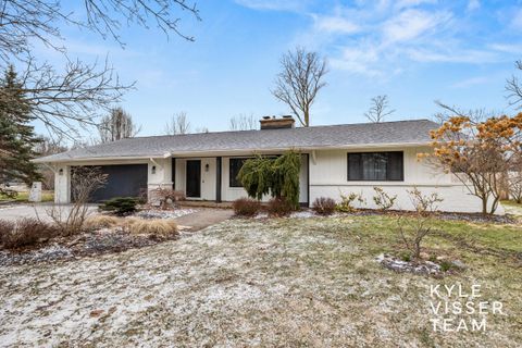 Photo of 2031 Brunsink Drive NE, Grand Rapids, MI 49503 (MLS # 26012207)