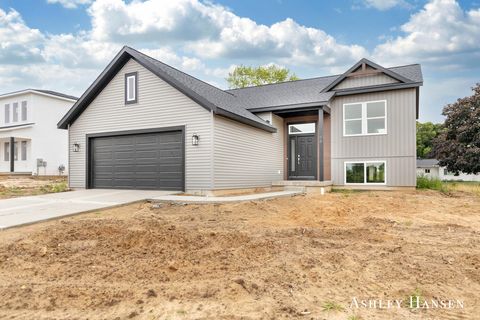 Photo of 98 Chase Court NW, Kent City, MI 49330 (MLS # 25035883)