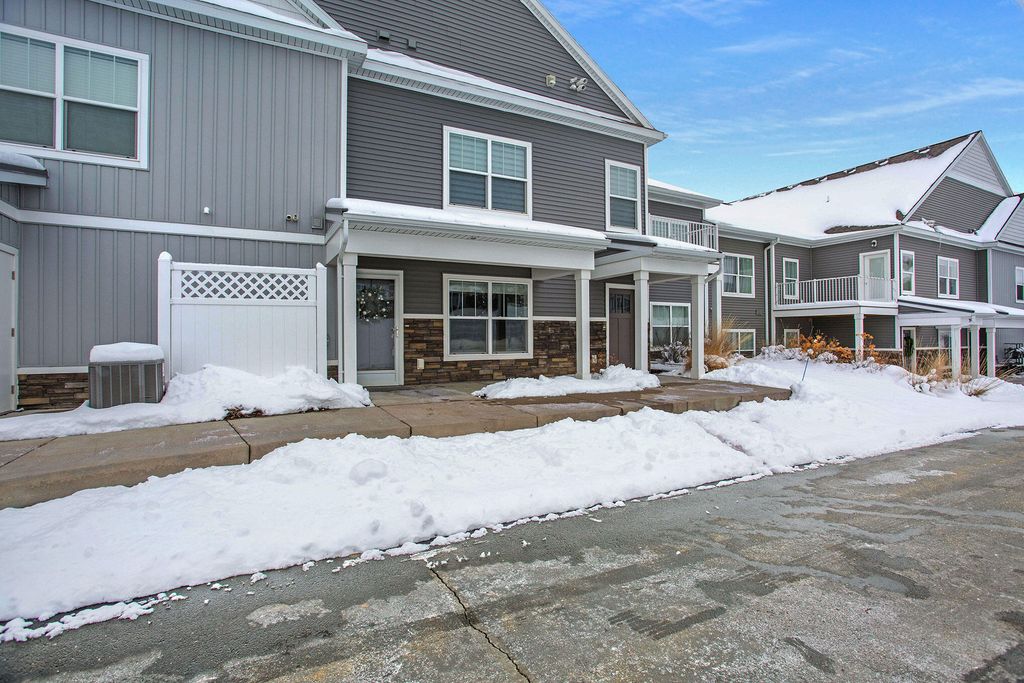 Photo of 3521 Crystal River Street SW #111, Wyoming, MI 49418 (MLS # 23003179)