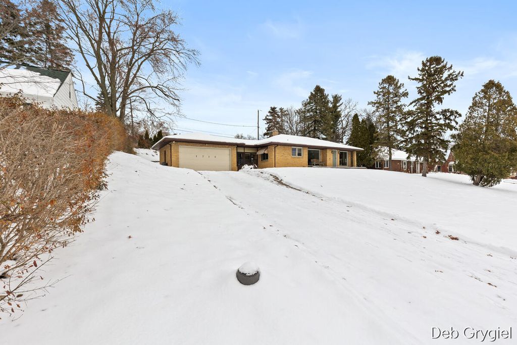 Photo of 1715 Oswego Street NW, Grand Rapids, MI 49504 (MLS # 25061610)