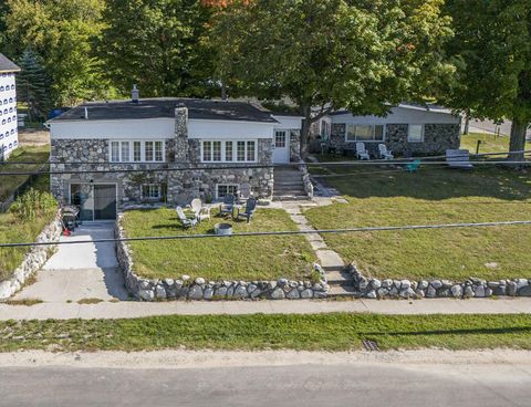 Photo of 4642 Main Street, Onekama, MI 49675 (MLS # 25057997)