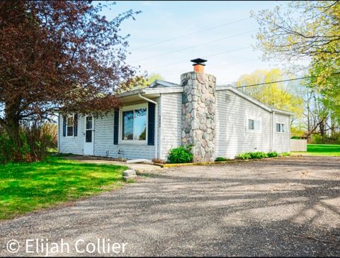 Photo of 9806 Belding Road NE, Rockford, MI 49341 (MLS # 26018968)