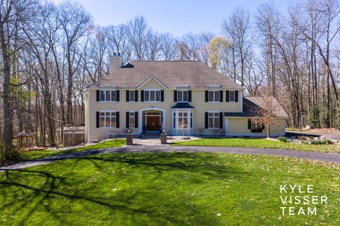 Photo of 4608 Old Grand River Trail NE, Ada, MI 49301 (MLS # 26016930)