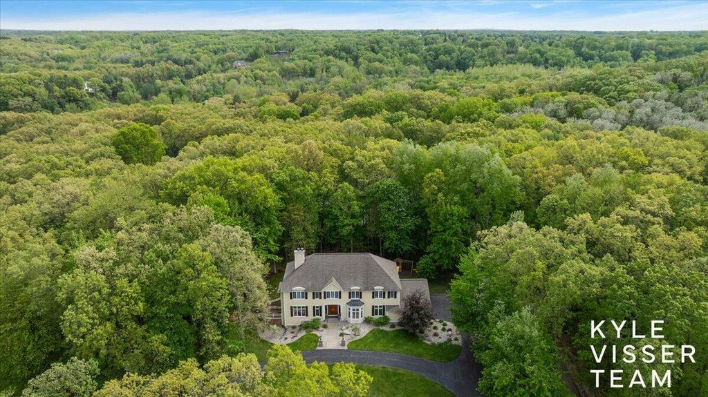 Photo of 4608 Old Grand River Trail NE, Ada, MI 49301 (MLS # 26016930)