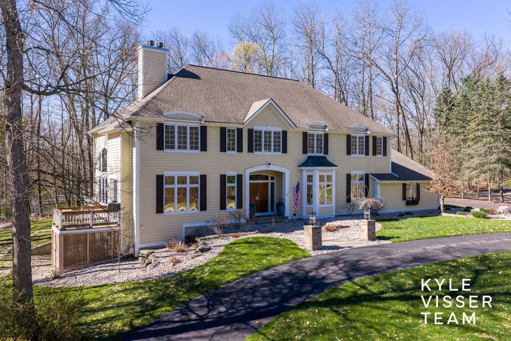 Photo of 4608 Old Grand River Trail NE, Ada, MI 49301 (MLS # 26016930)