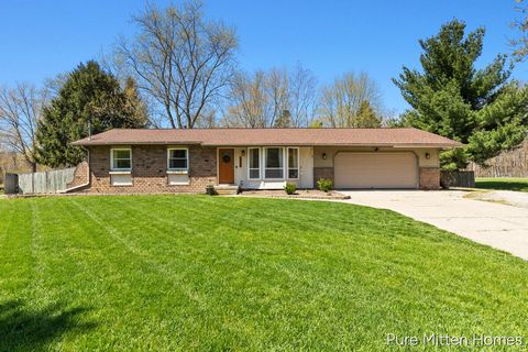 Photo of 13839 Windemere Drive NW, Grand Rapids, MI 49534 (MLS # 26017350)